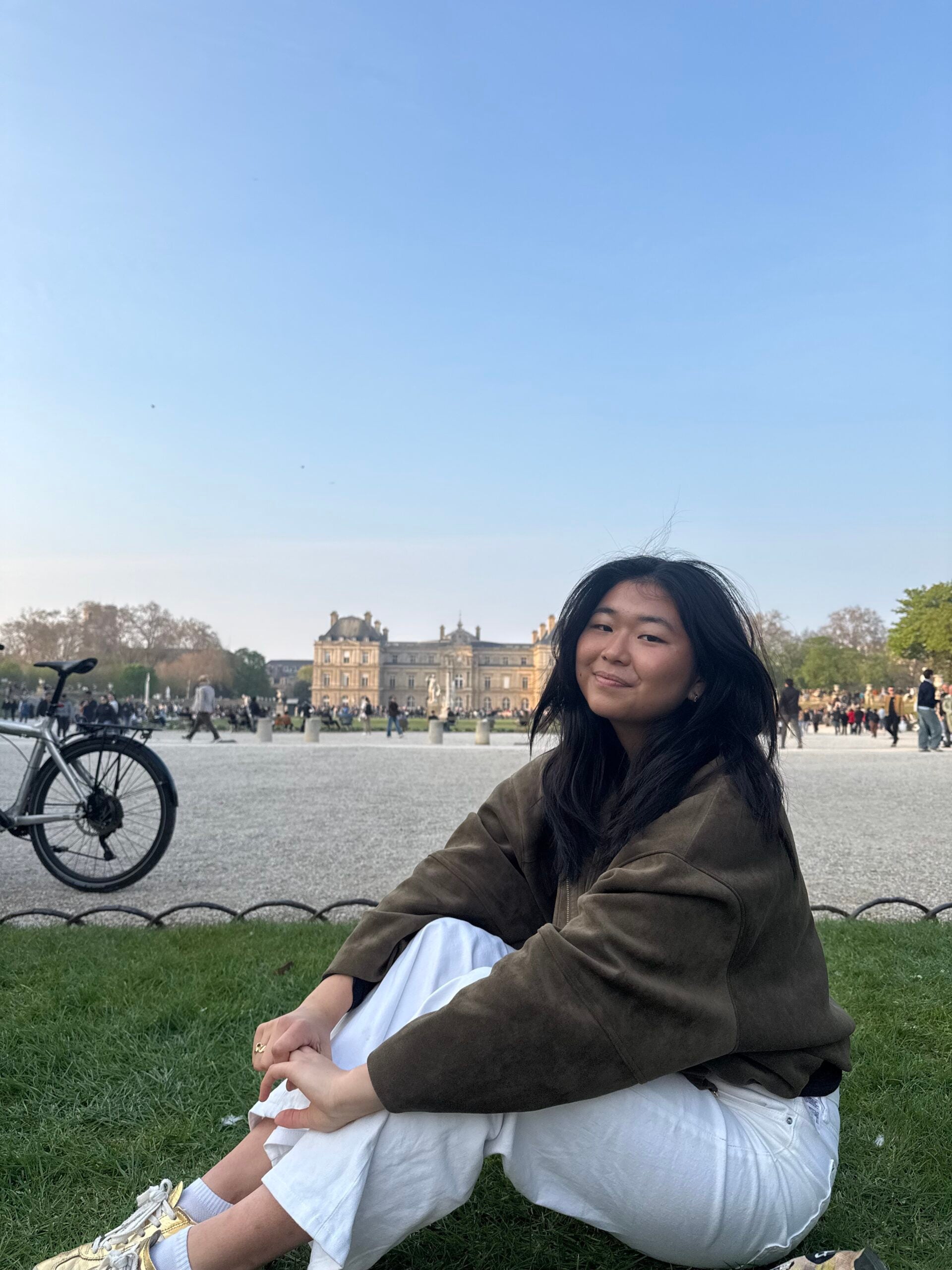 Eryn sitting on grass